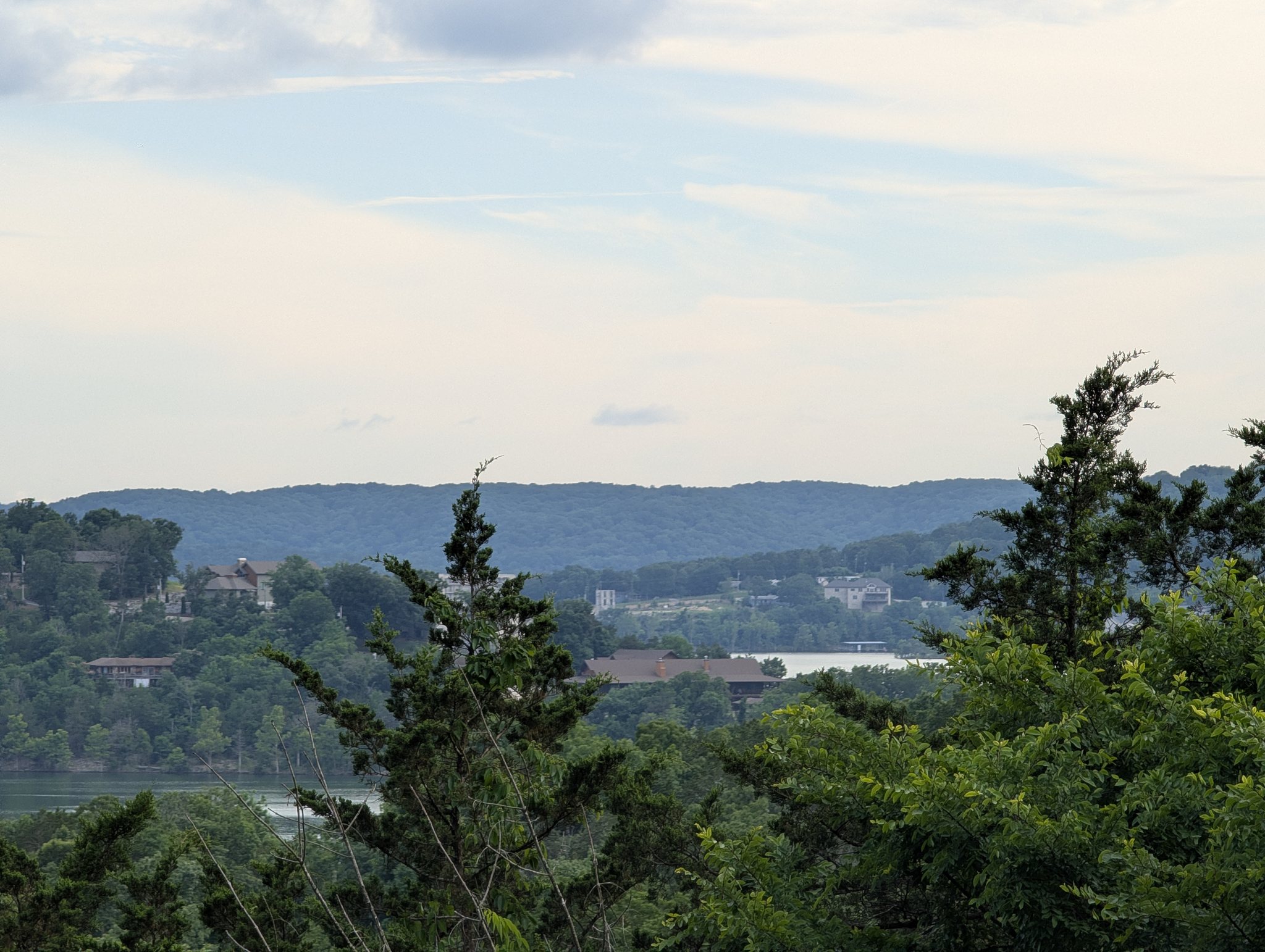 Overlook of Table Rock Lake and Big Cedar Lodge buildings nestled in Ozarks hills near Branson, Missouri