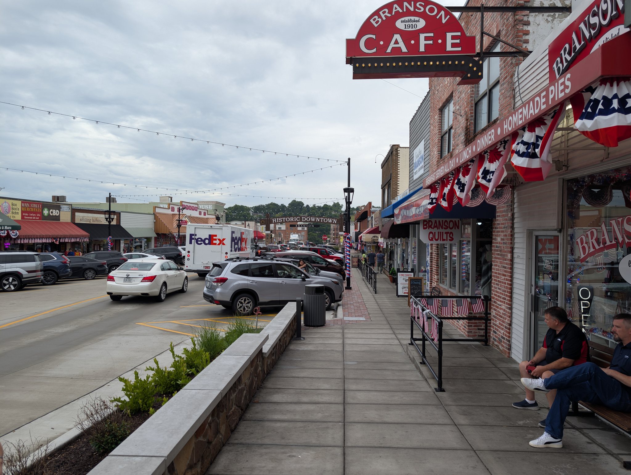 Historic Downtown Branson Main Street with the Branson Cafe sign and Historic Downtown arch
