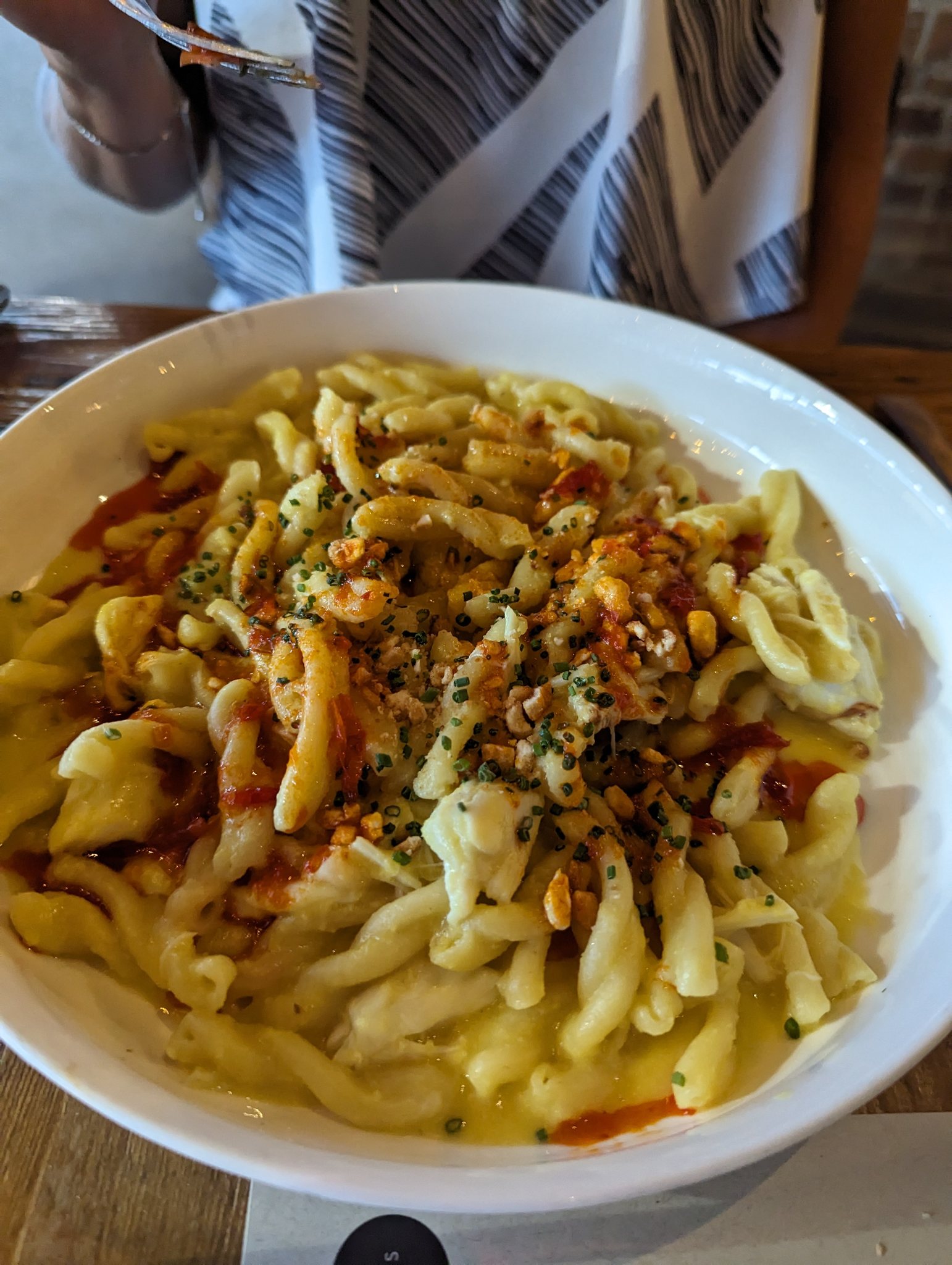 Twisted pasta dish with creamy sauce at Brazen Open Kitchen in Dubuque Iowa