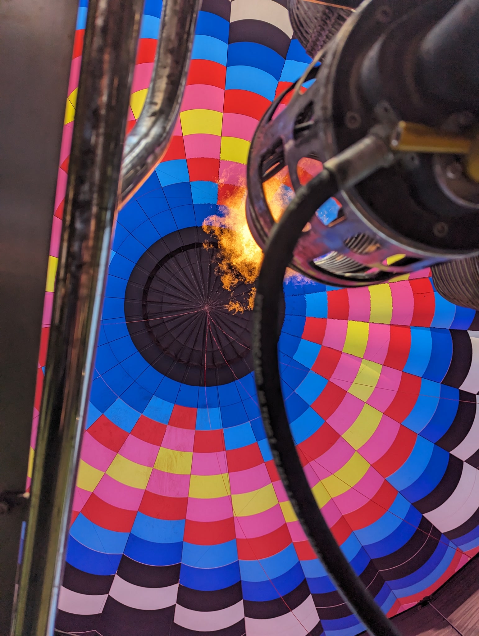 Looking up into a hot air balloon burner and colorful envelope near Galena Illinois