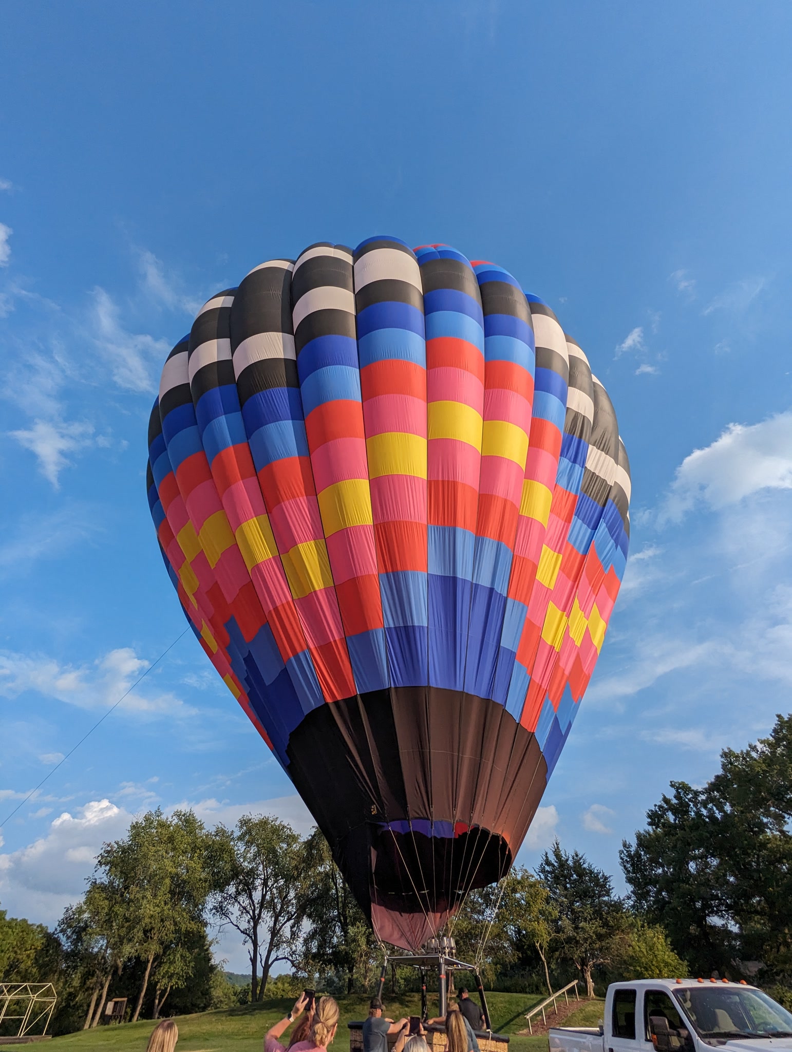 Fully inflated hot air balloon on a grassy field near Galena Illinois