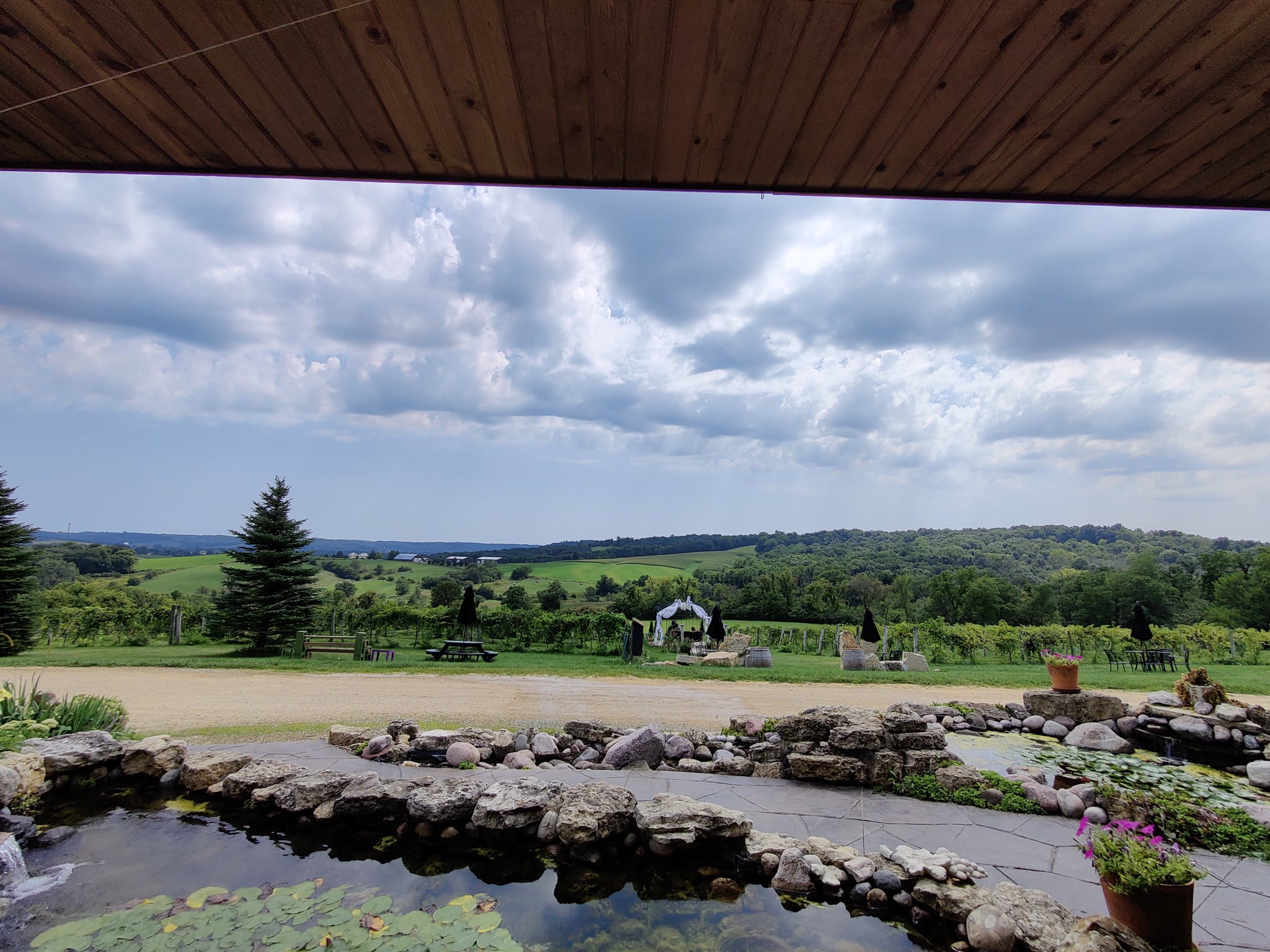 Patio overlook with ponds and vineyard views at Fergedaboudit Vineyard near Galena Illinois