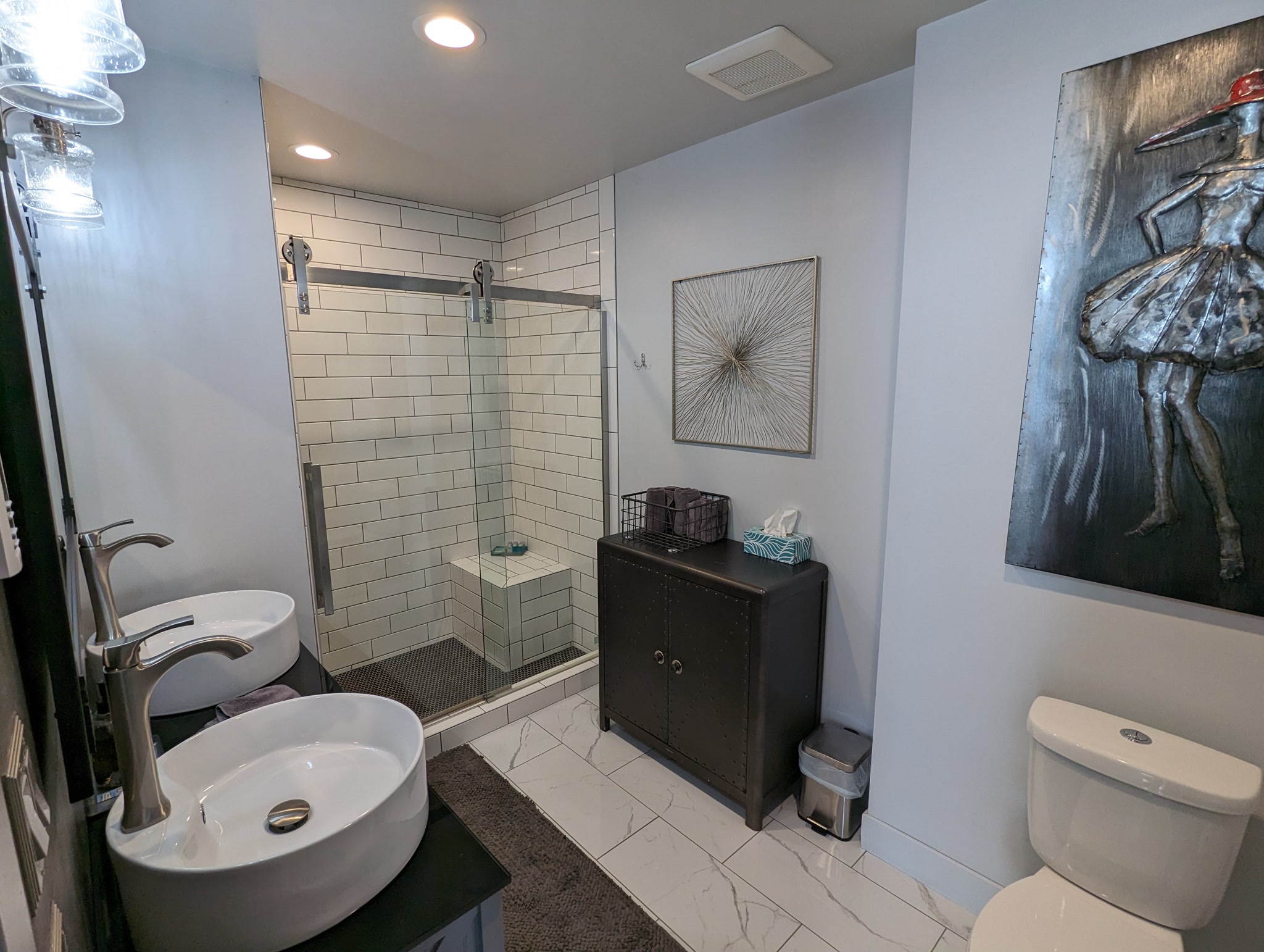 Bathroom with dual sinks at Suite Victory Airbnb in Galena Illinois