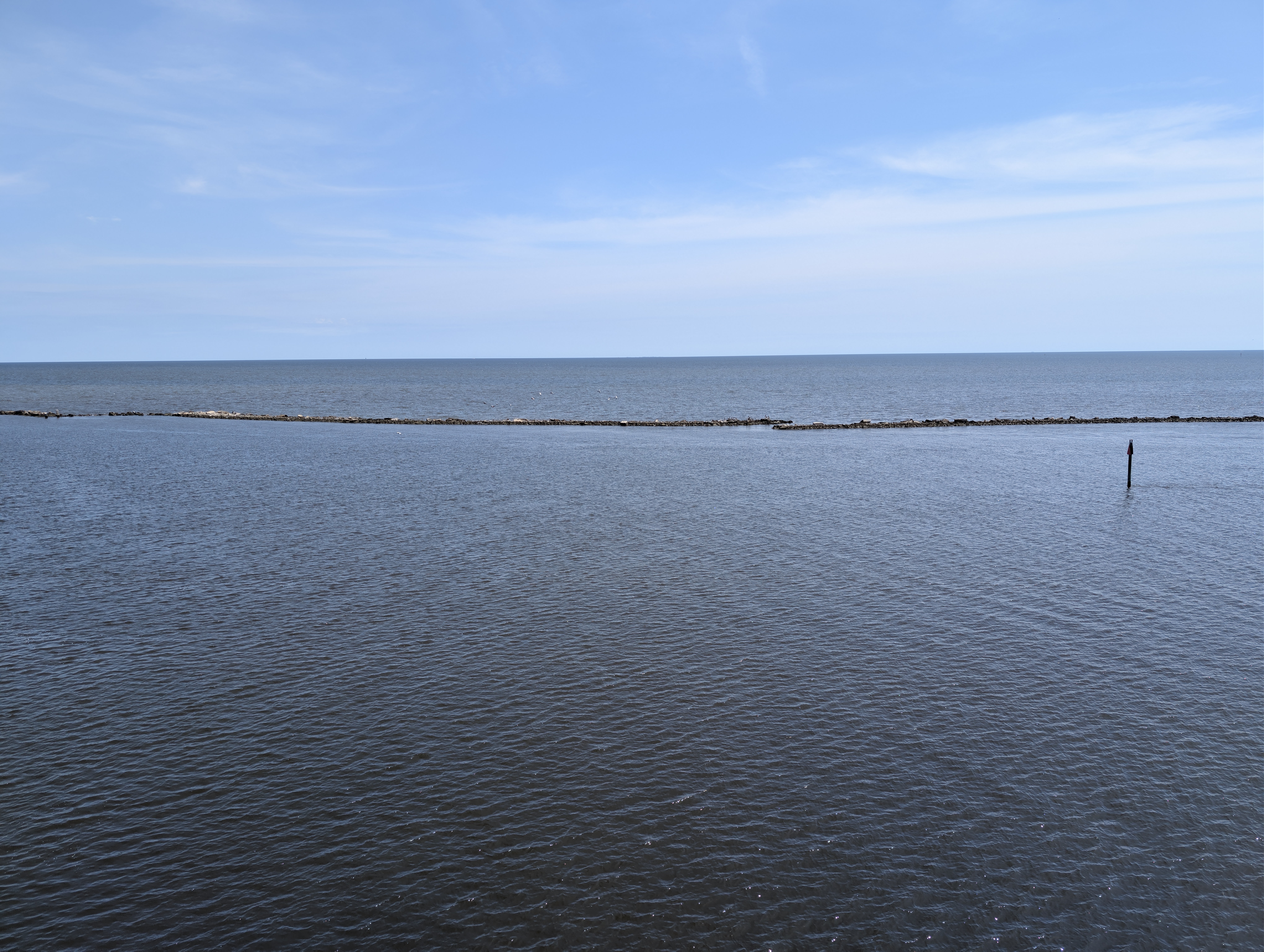 Calm Mississippi Sound and the rock breakwater from the Beau Rivage pool deck in Biloxi
