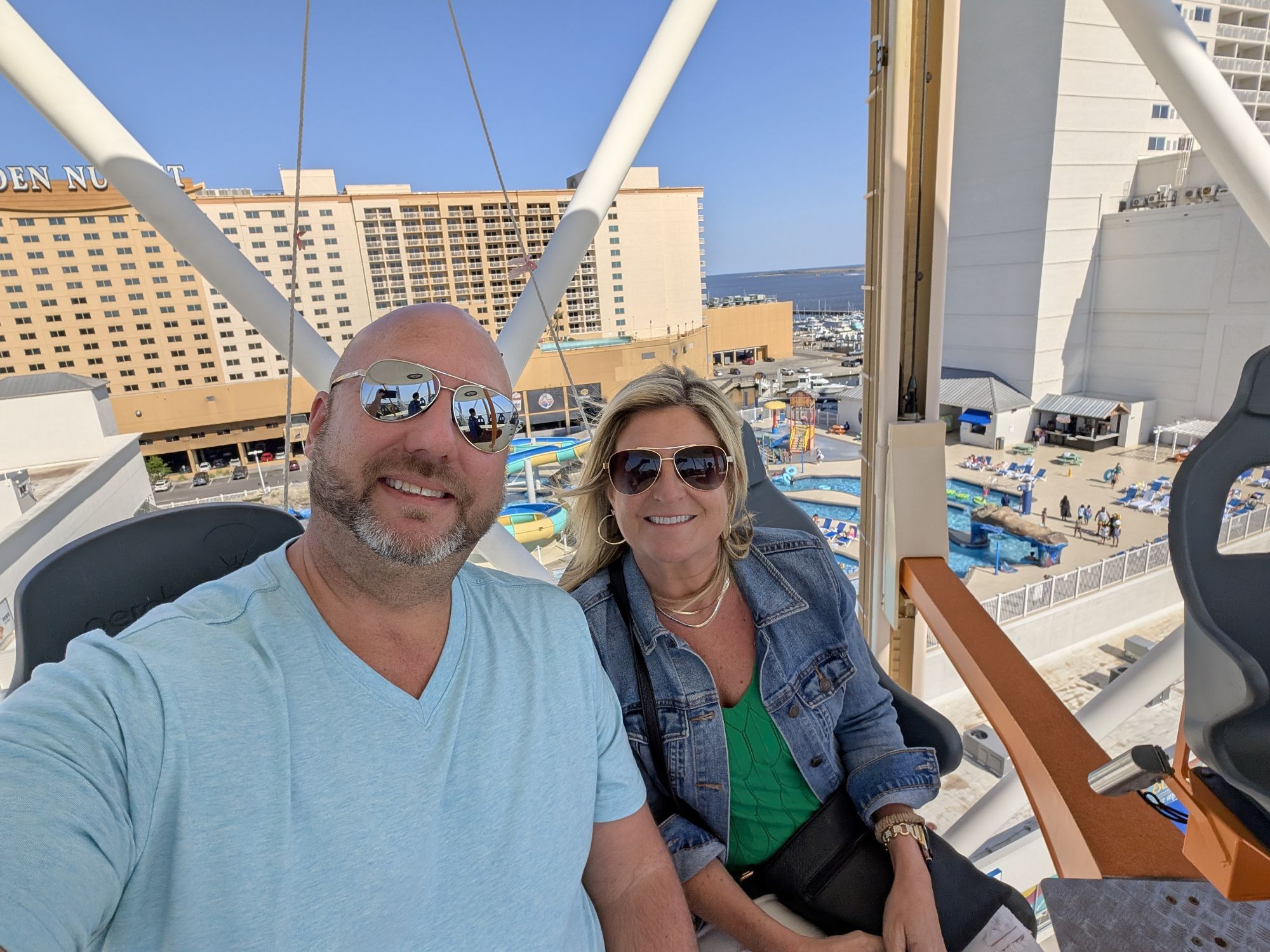 Kelli and me on the Aerobar at Paradise Pier Fun Park, looking over the Golden Nugget and water park in Biloxi